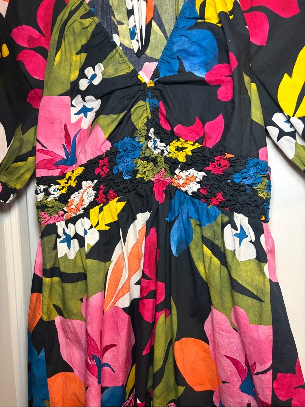 SAYLOR | Black Floral V-Neck Mini Dress with Bright Blooms and Smocked Waist - Picture 3 of 10